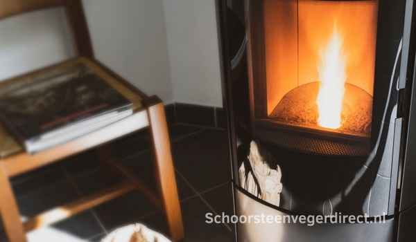 Pelletkachel laten vegen door een schoorsteenveger