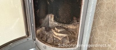 Het vervangen van het vermiculiet binnenwerk van een speksteenkachel